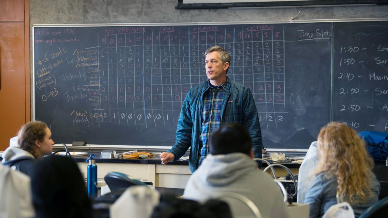 Eric Sanford teaches a class of students. 