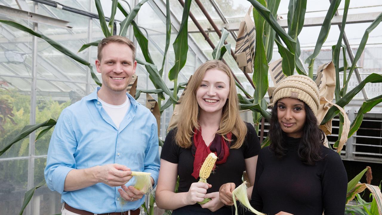 Zerbe stands with graduate students Katie Murphy and Prema Karunanithi