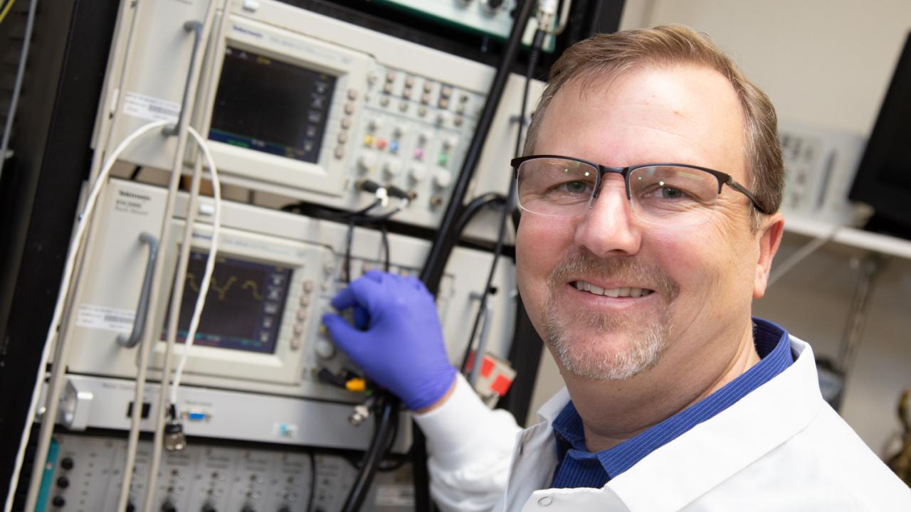 Professor W. Martin Usrey stands in his lab. 