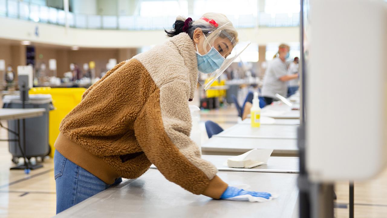 Student cleaning arc testing station