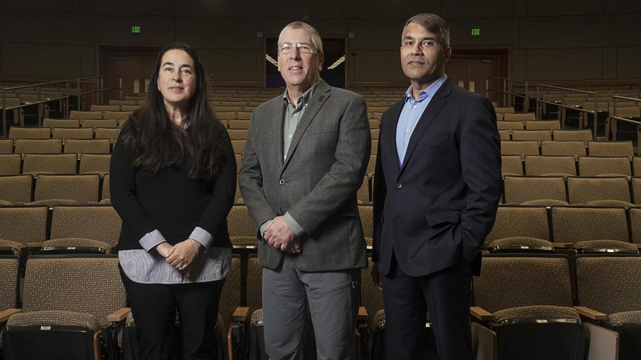 Alumni couple Kamaljeet Singh-Khaira and Dr. Ravinder Khaira have given $1 million to CBS. In recognition of their gift, the Sciences Lecture Hall will be renamed the Ravinder and Kamaljeet Khaira Lecture Hall. They are pictured here inside the Sciences Lecture Hall with Dean Mark Winey. (Karin Higgins / UC Davis)