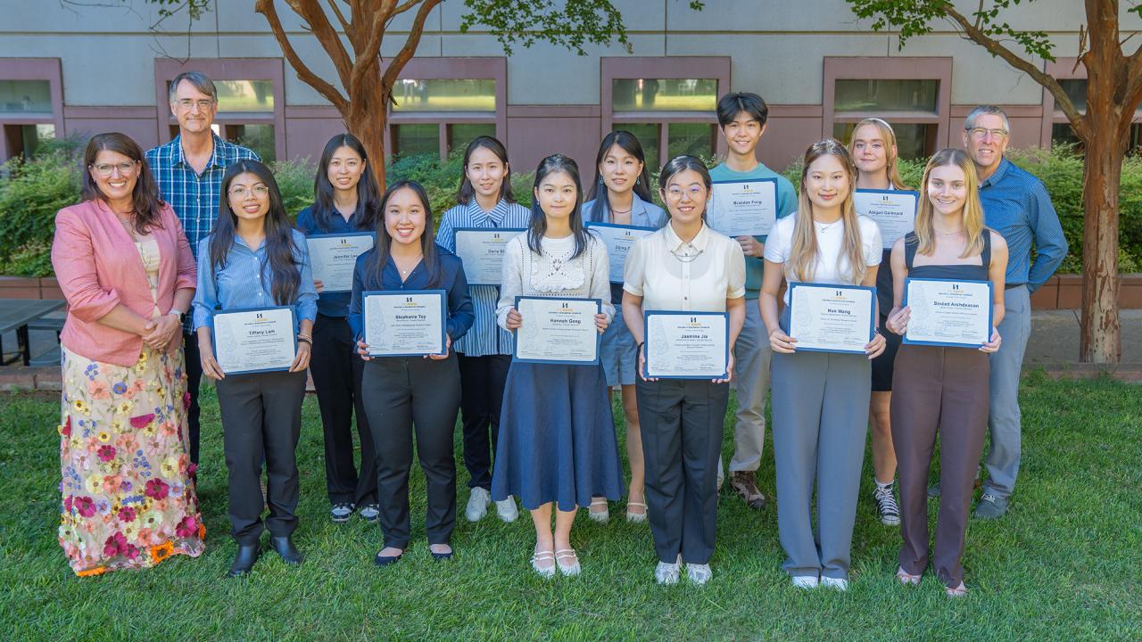 SURP scholars and mentors pose with certificates after completing a summer of donor-supported undergraduate research.