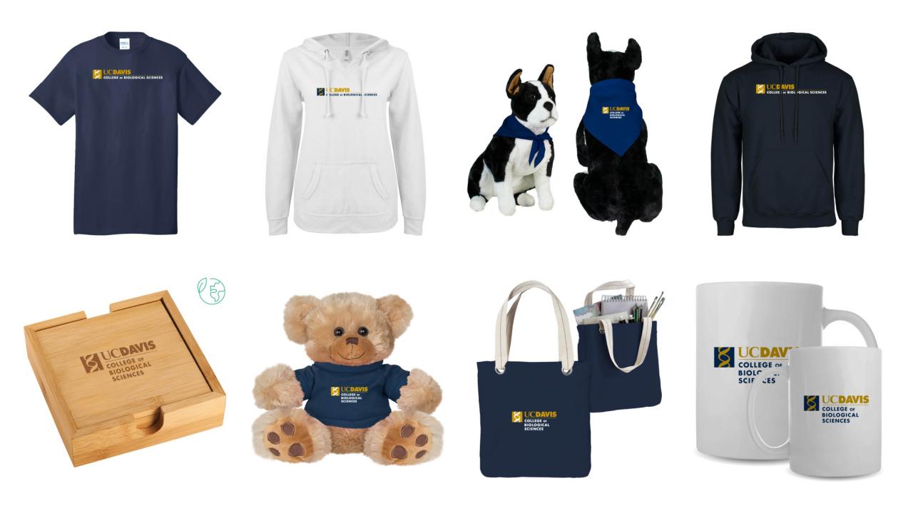 Assorted UC Davis College of Biological Sciences merchandise including shirts hoodies mugs tote bags plush toys and coasters