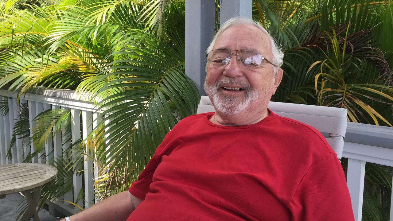 Edmund Bernauer on patio chair. 
