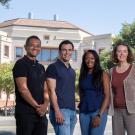 Professor Aldrin Gomes, students Leib Lipowsky and Tayler Smith and BUSP Director Connie Champagne stand outside the Life Sciences Building.