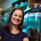 Rachael Bay sits in her lab