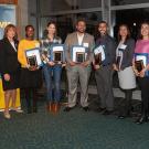 UC Davis’ new CAMPOS Faculty Scholars (holding certificates and plaques), from left, Maureen Njoki Kinyua, Rebecca Hernandez, Jesús M. Velázquez, Samuel Díaz-Muñoz, Jeanette Ruiz and Verónica Martínez-Cerdeño. They are flanked by, from far left, Linda P.B. Katehi, chancellor emerita and UC Davis ADVANCE principal investigator; Karen McDonald, faculty director and co-principal investigator; and Mary Lou de Leon Siantz, CAMPOS founding director; and, at far right, 2015 CAMPOS Faculty Scholars Alexis Patterson
