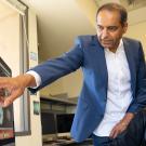 Why We Remember, a new book by Center for Neuroscience researcher Charan Ranganath, combines the latest research with personal experience to share how memory actually works and the role it plays in our daily lives. Pictured, Ranganath in his lab at the Center for Neuroscience. (Sasha Bakhter / UC Davis)